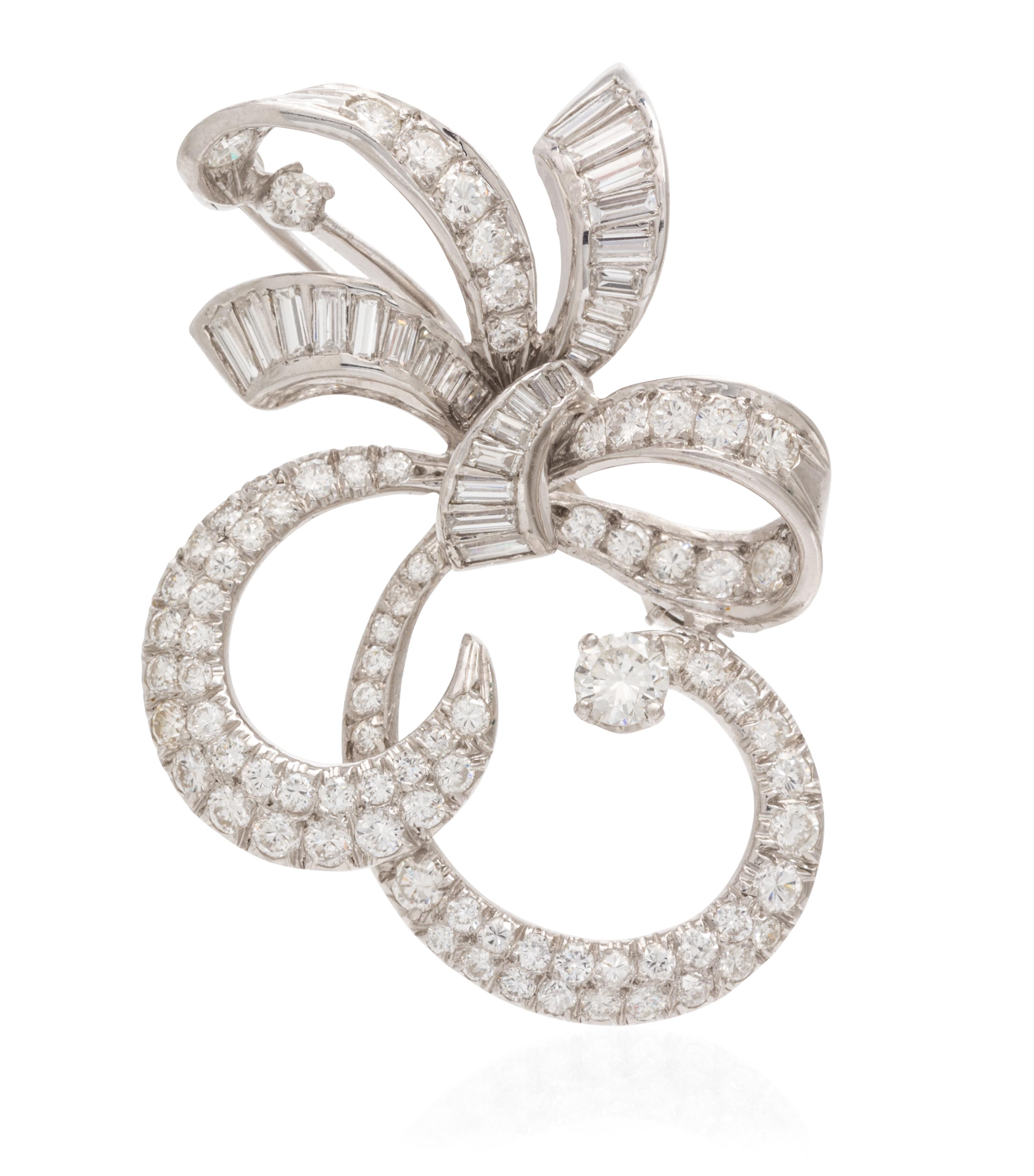 A Platinum and Diamond Bow Brooch, 7.70 dwts.