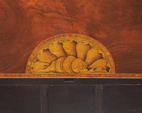 A fine pair of George III inlaid mahogany demilune card tables, circa 1790