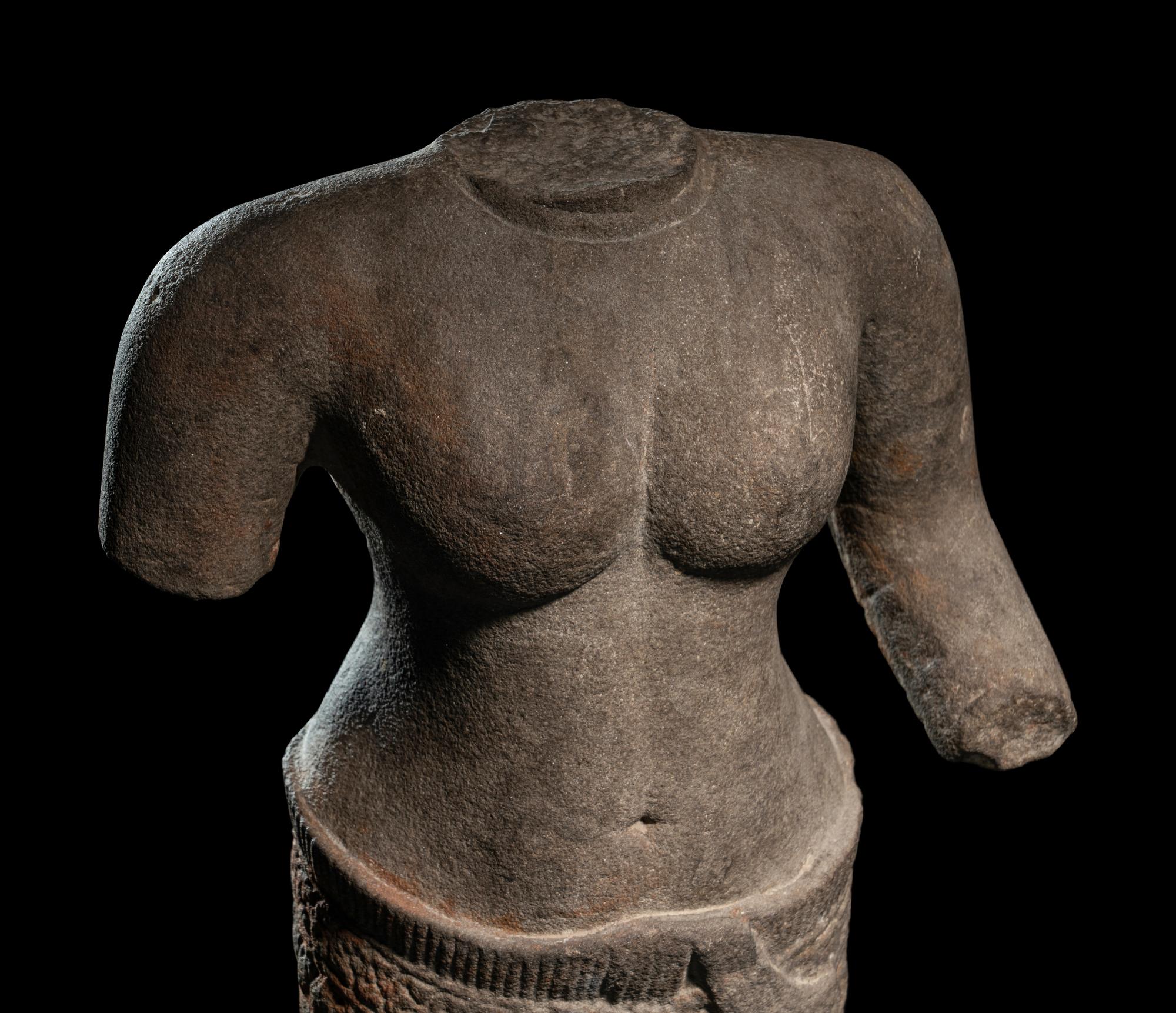 A Khmer Greystone Torso of a Woman