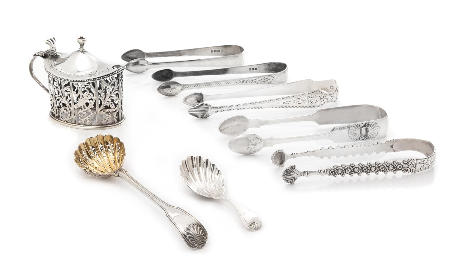 A Group of Seven English Silver Serving Articles, Various Makers, comprising five sugar tongs, a sugar spoon, a bon bon spoon and a mus
