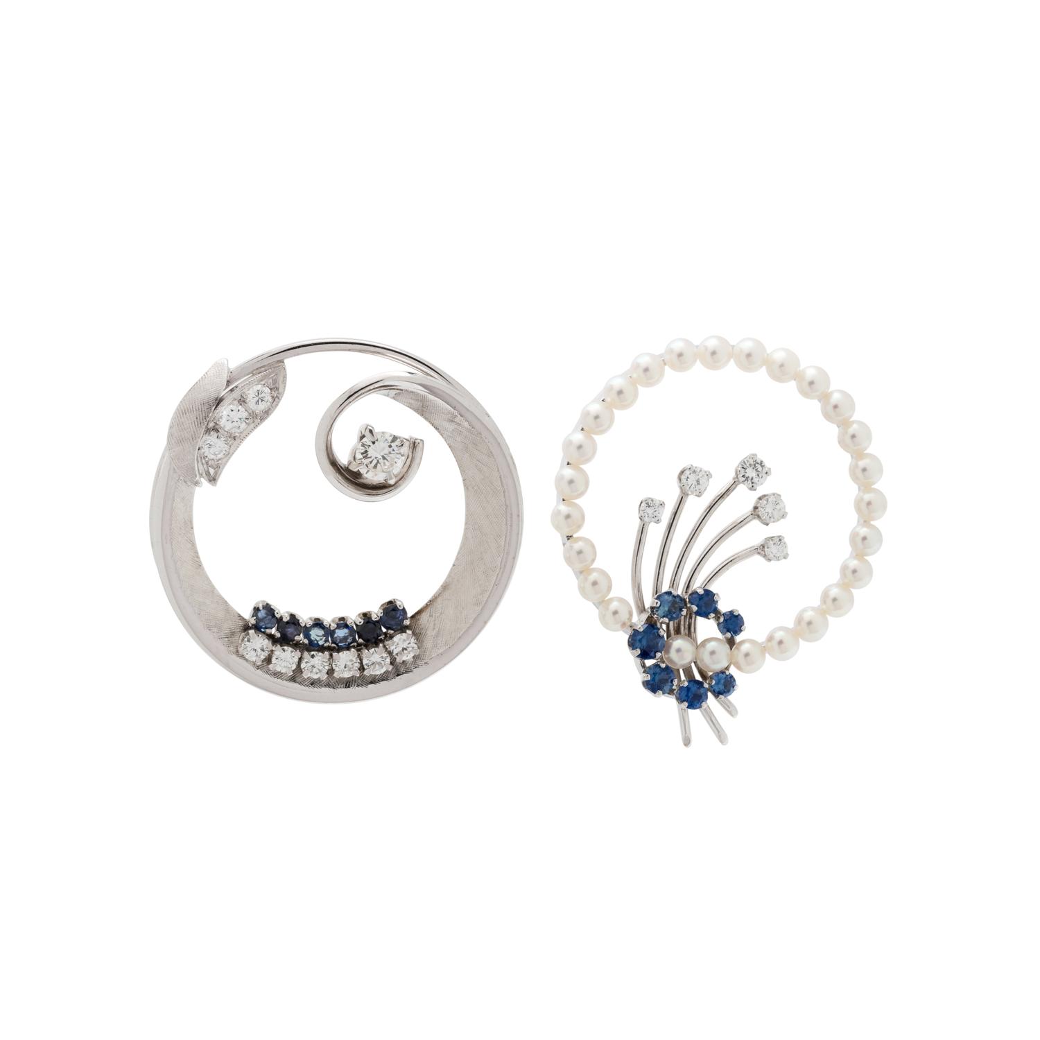 COLLECTION OF WHITE GOLD AND DIAMOND CIRCLE BROOCHES
