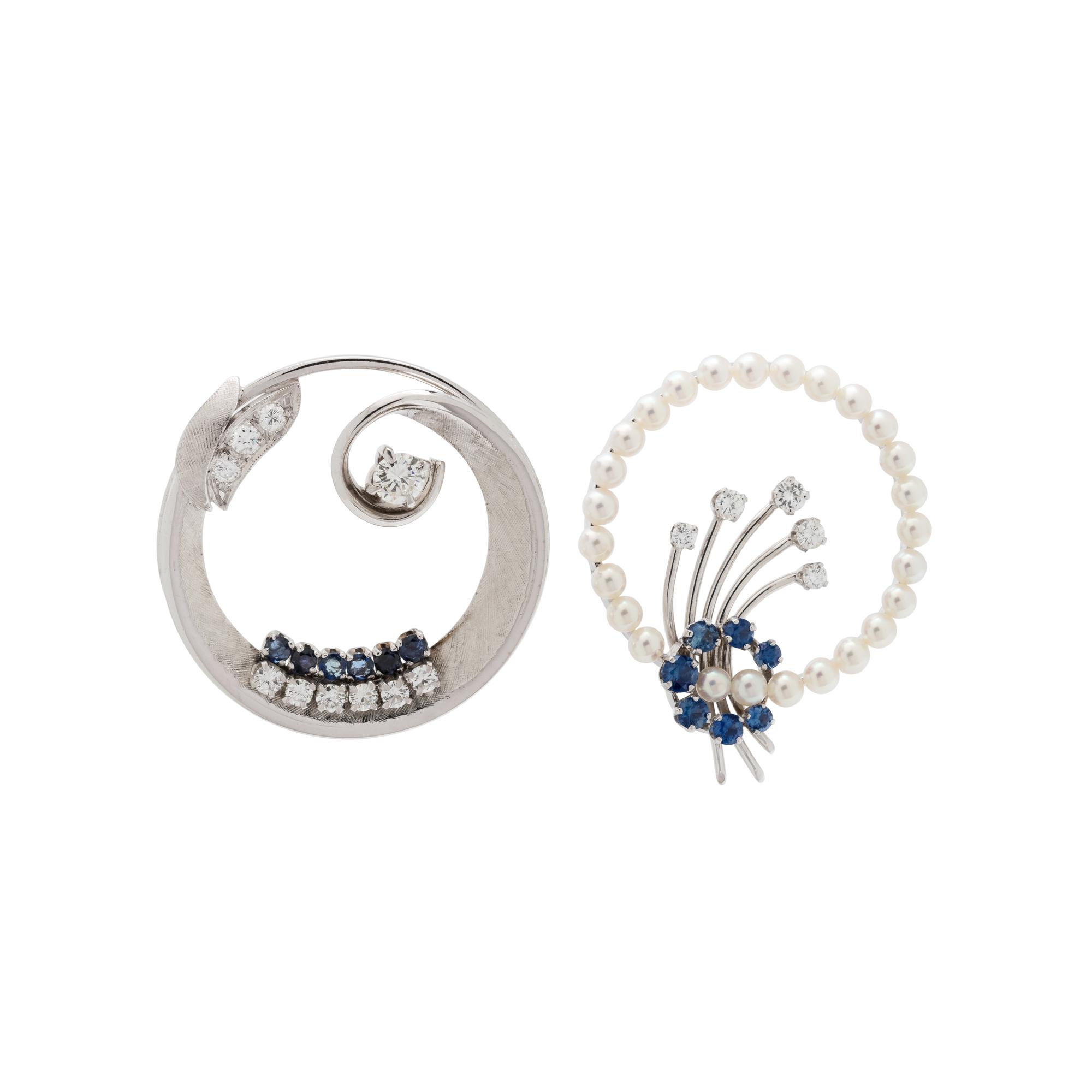 COLLECTION OF WHITE GOLD AND DIAMOND CIRCLE BROOCHES