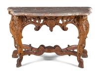 A Pair of Régence Carved Oak Marble-Top Console Tables
