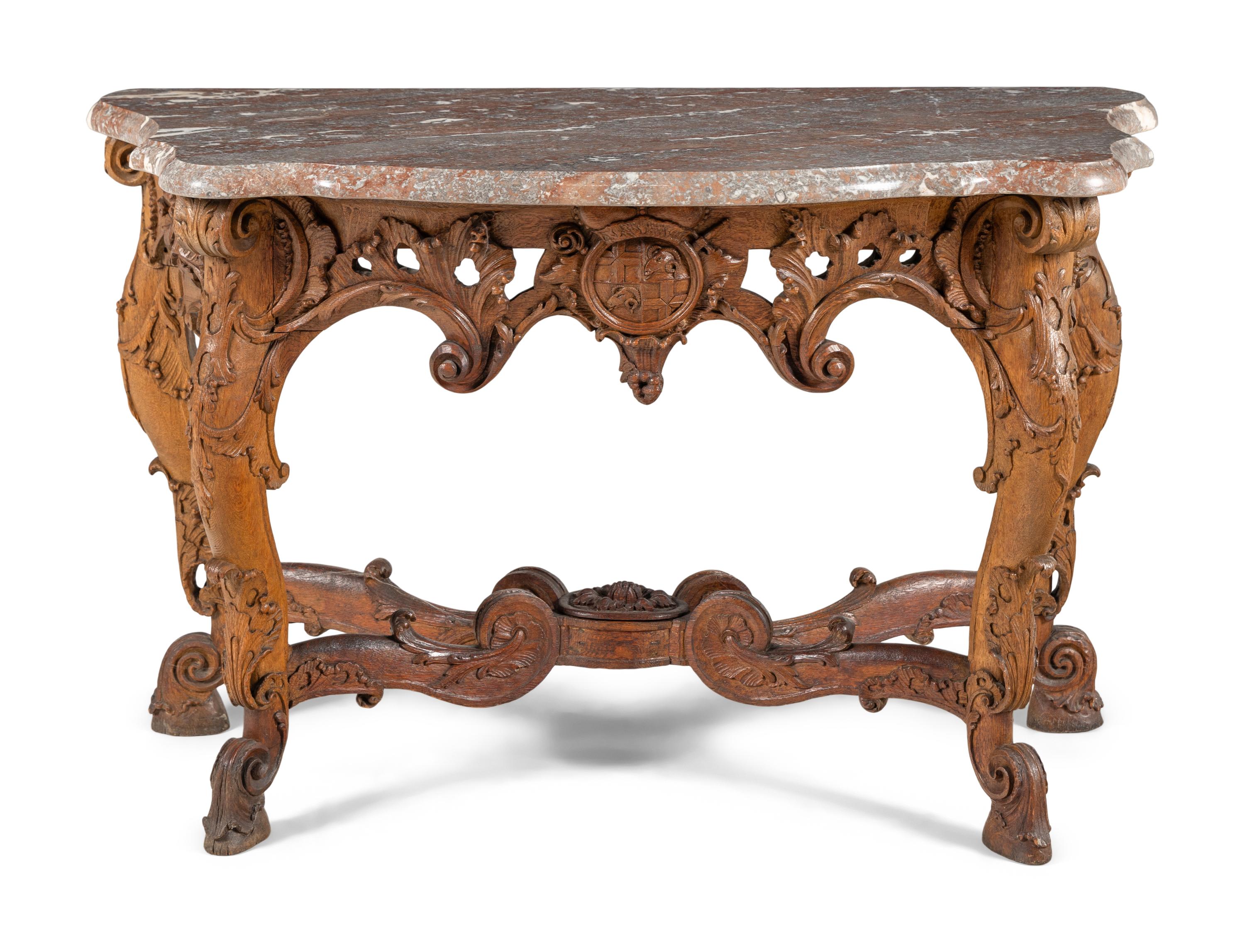 A Pair of Régence Carved Oak Marble-Top Console Tables