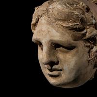 An Eastern Roman Stucco Head of a Woman