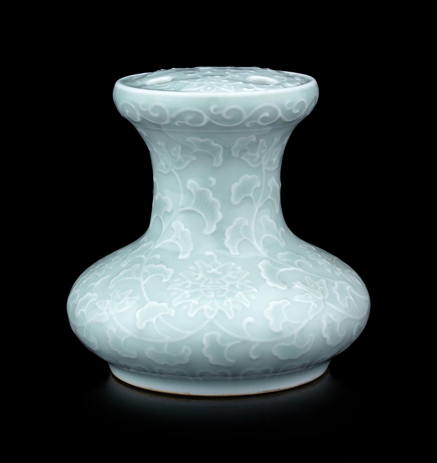 A Pale Celadon Glazed Molded Flower Pot