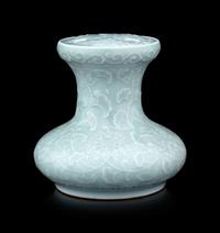 A Pale Celadon Glazed Molded Flower Pot