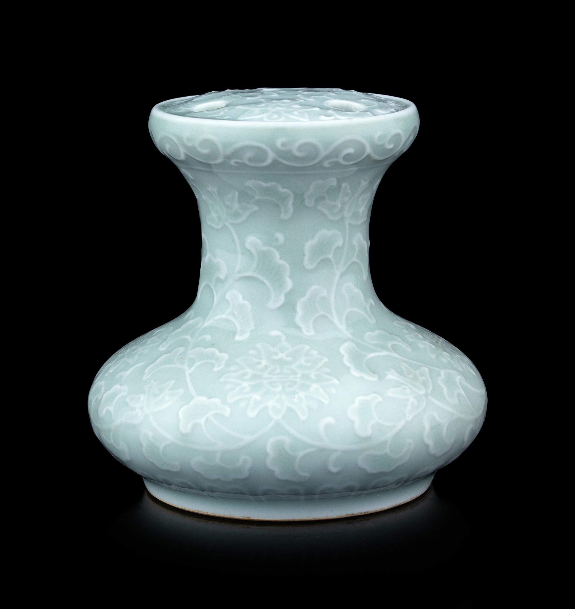 A Pale Celadon Glazed Molded Flower Pot