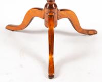 A Swedish Parcel Ebonized Birch Tilt-Top Table