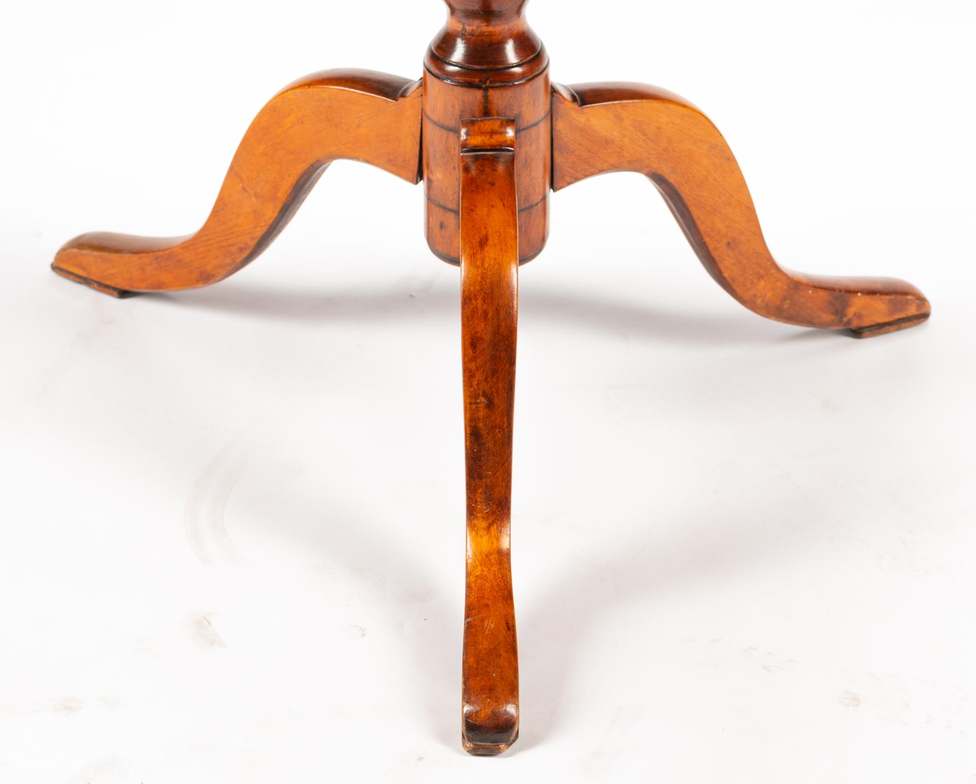 A Swedish Parcel Ebonized Birch Tilt-Top Table