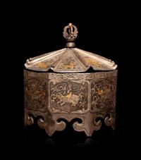 A Tibetan Gilt Decorated Metal Covered Box