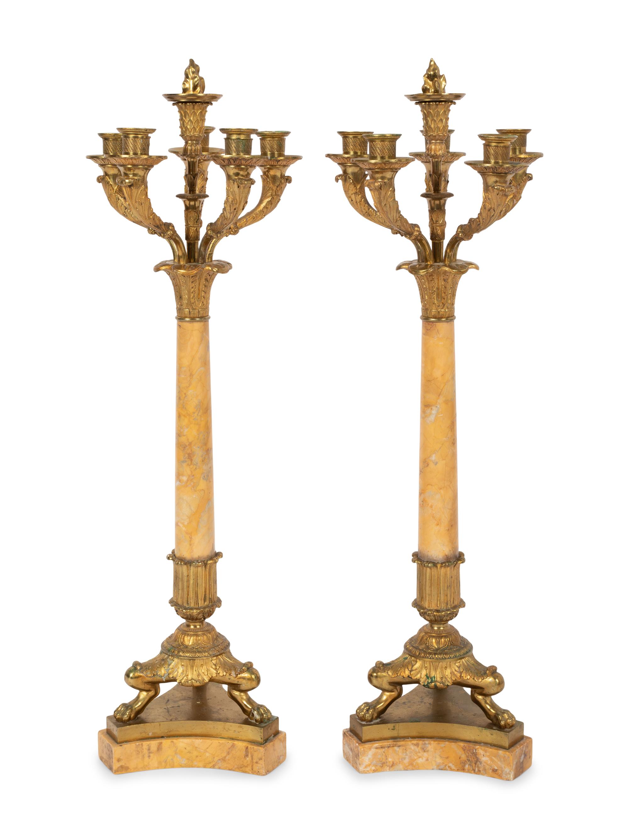 A Pair of Charles X Gilt Bronze and Marble Five-Light Candelabra