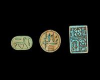 Two Egyptian Faience Seals and an Inscribed Bead