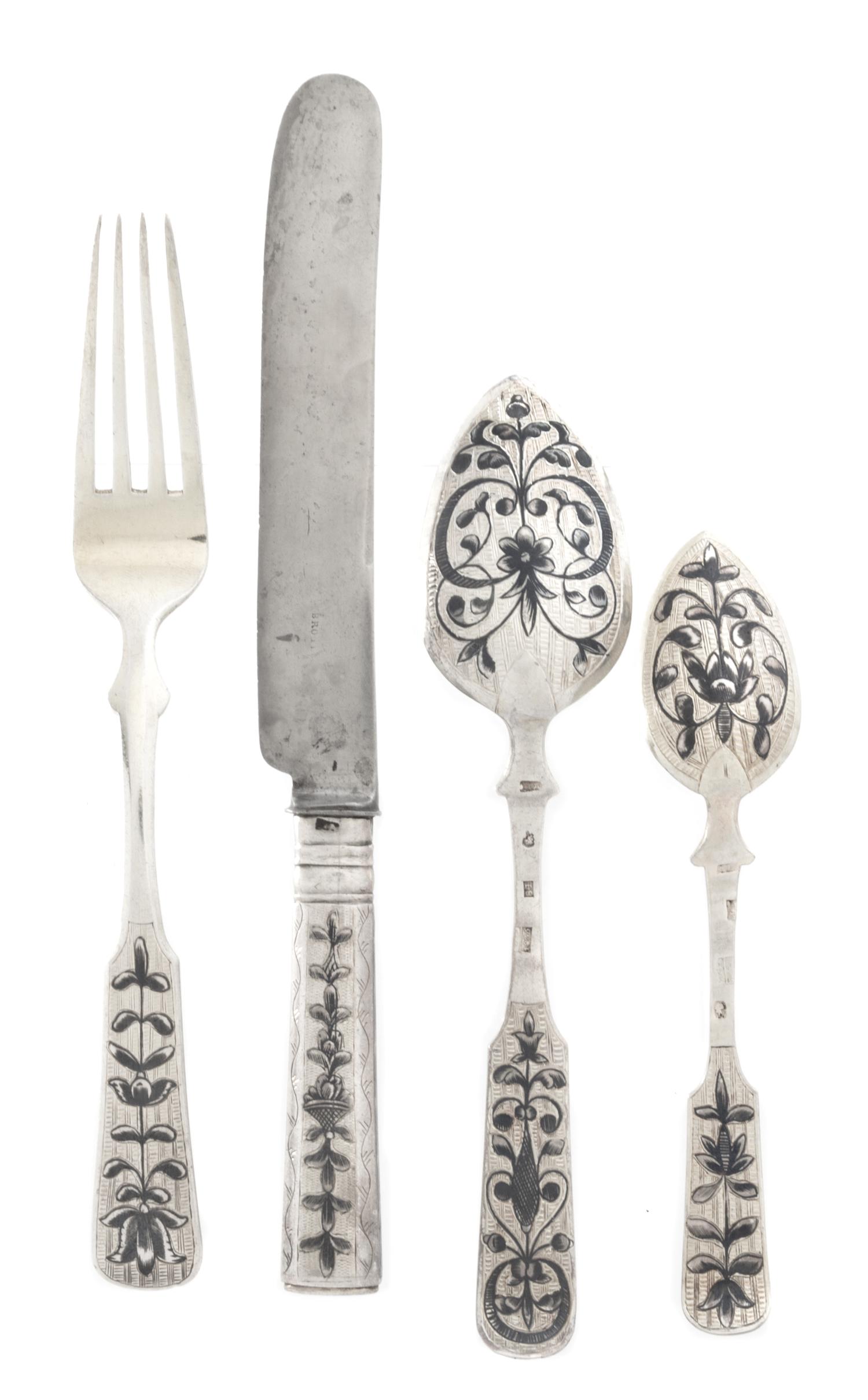A Russian Niello Silver Dessert Service, Pyotr Dimitrov and other maker, 19th Century, the forks and spoons of fiddle form, comprising: