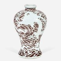 A Chinese carved and underglaze red "Dragons and Waves" vase, Meiping Yongzheng six-character mark and of the period