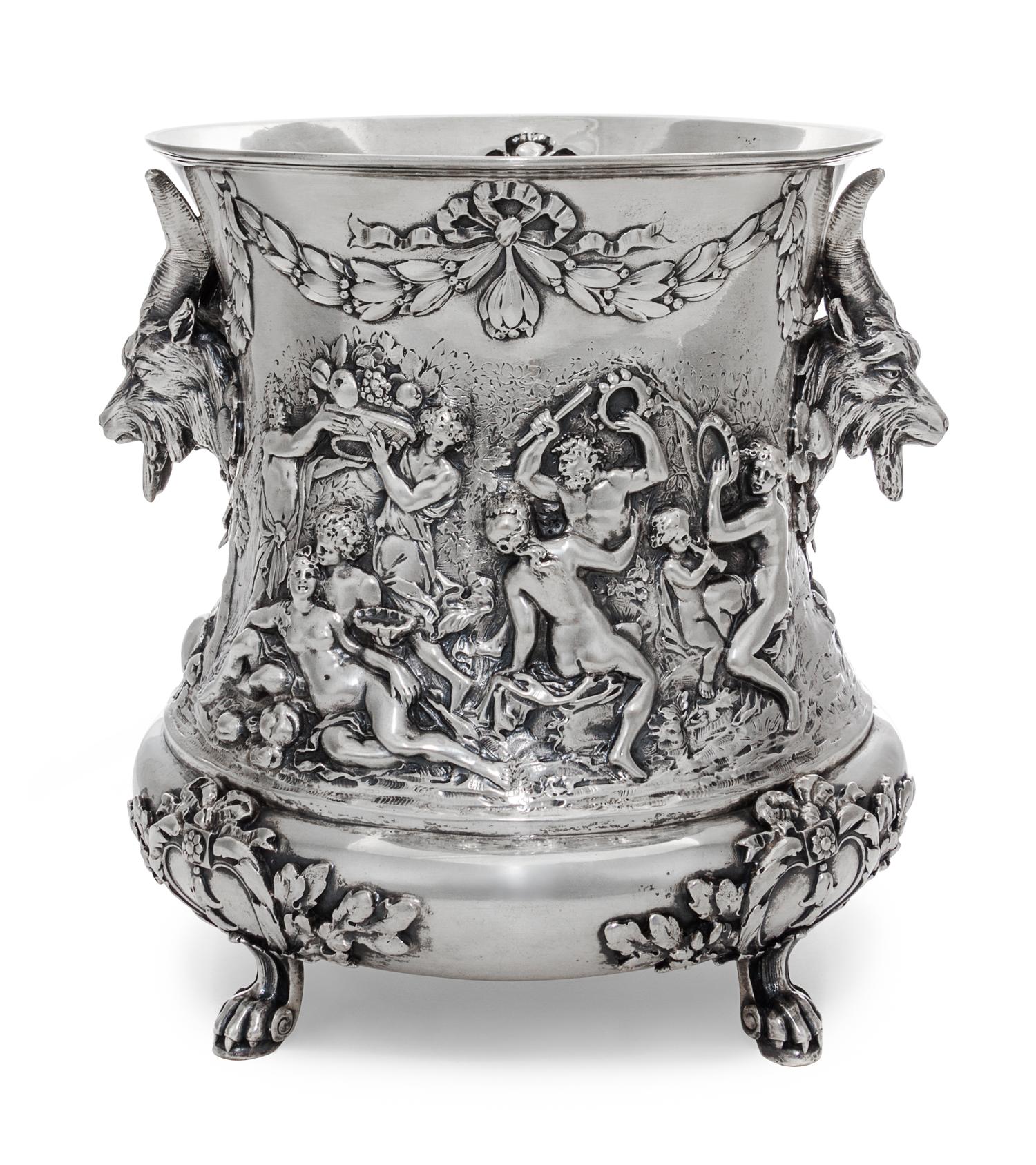 A German Silver Wine Cooler, Storck & Sinsheimer, Hanau, Early 20th Century, of campagna form, cast with a Bacchic merry-marking scenes