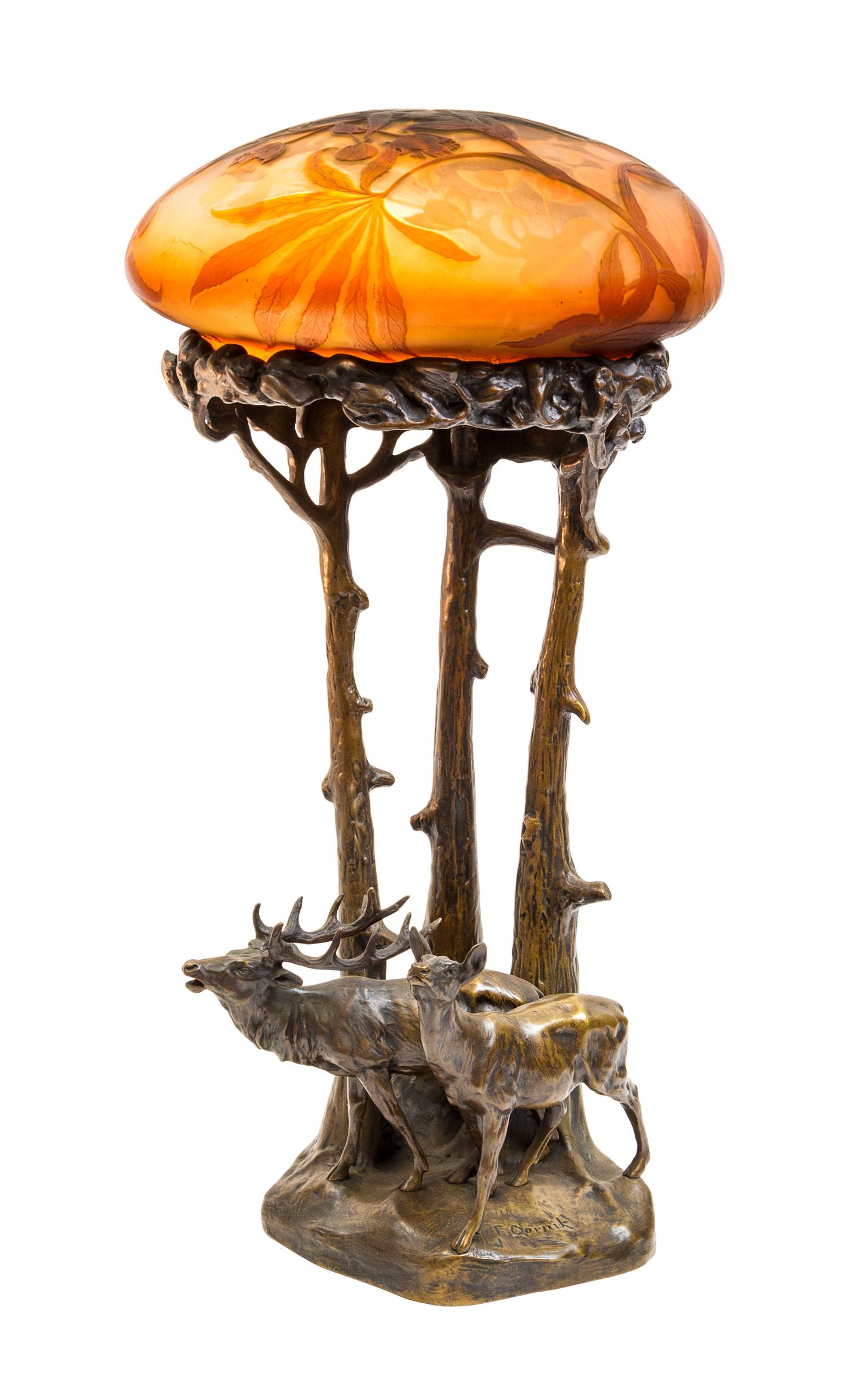 Emile Galle and Friedrich Gornik, (French, 1846-1904; Austrian 1877-1943), a table lamp, comprising a floral decorated domed shade, and