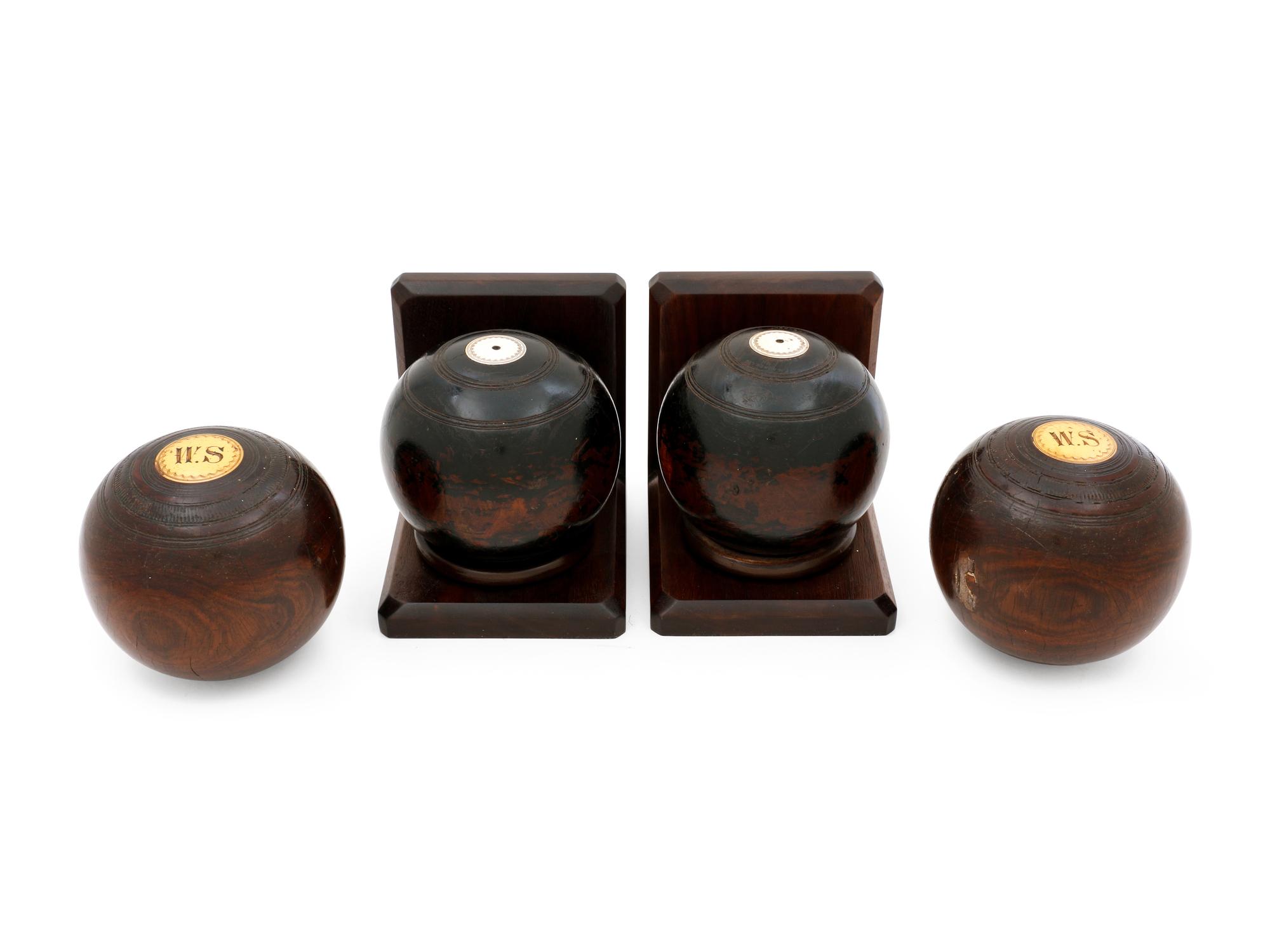 Four Lawn Bowling Balls