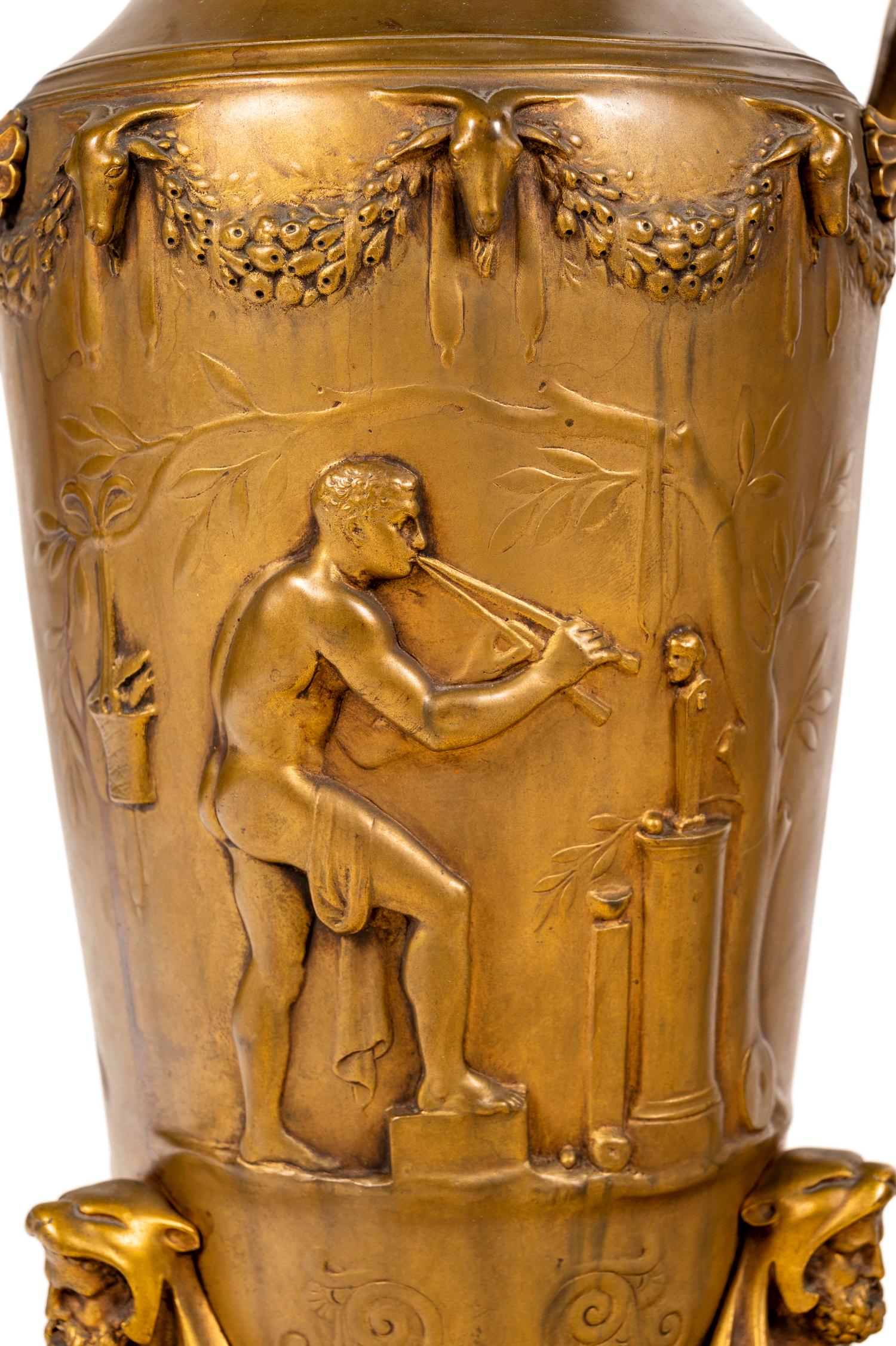 A Pair of French Gilt Bronze Tripod Vases