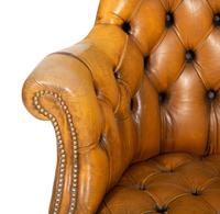 An English Button-Tufted Leather Armchair
