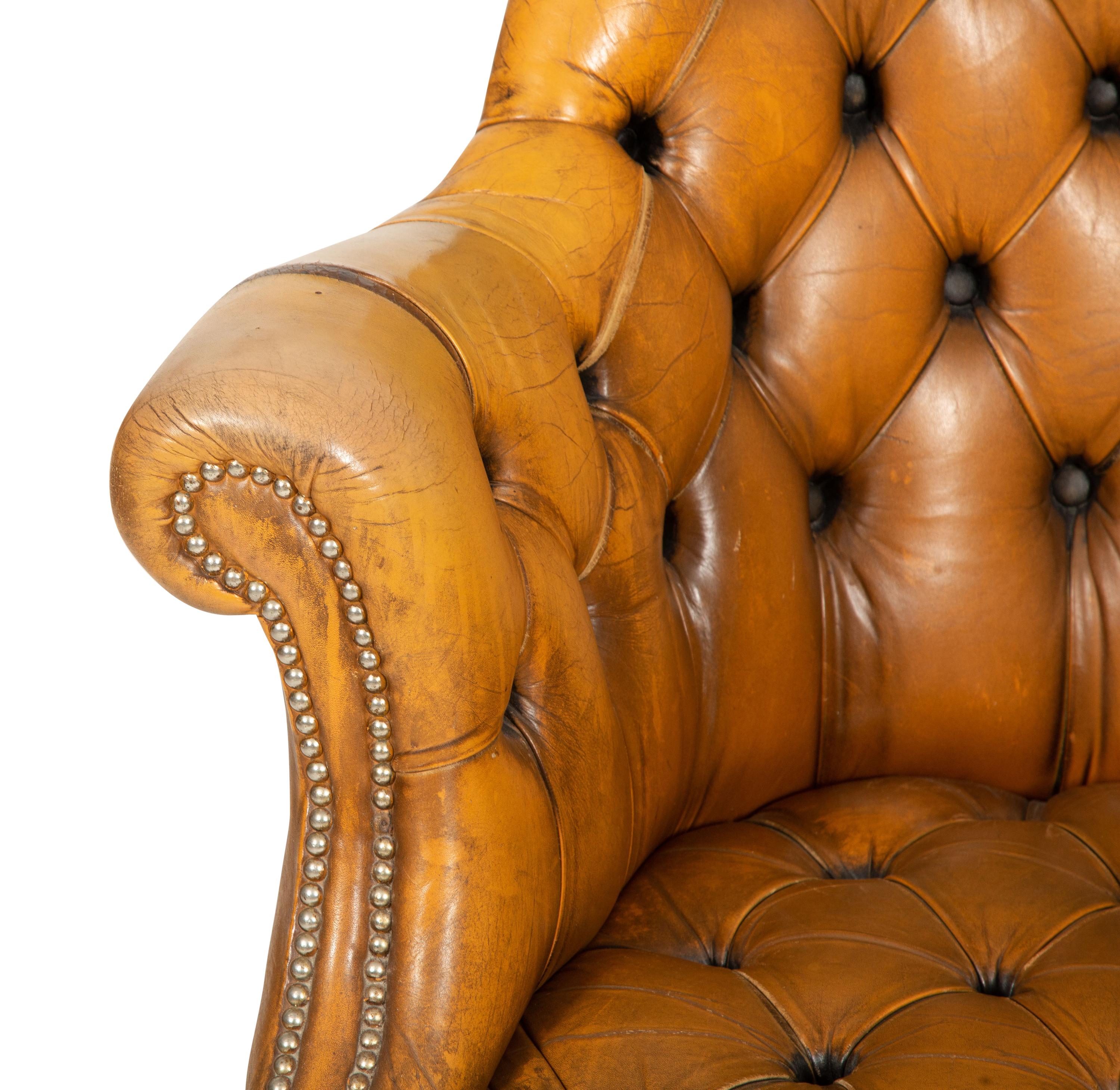 An English Button-Tufted Leather Armchair