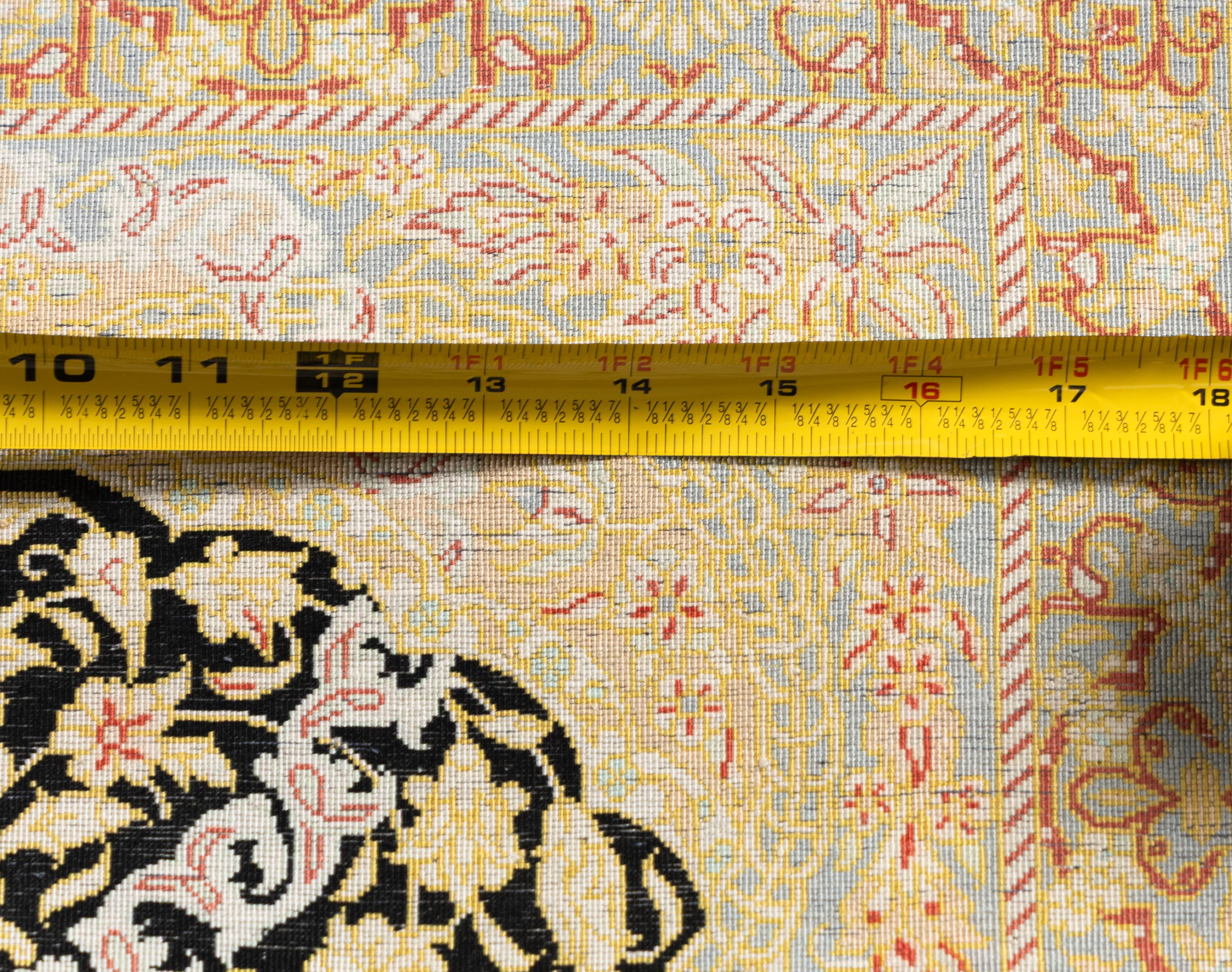 A Group of Five Silk Mats