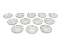 A Set of Twelve American Silver Martelé Coffee Cups and Saucers