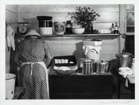 Marion Post Wolcott, (American, 1910-1990), A member of the Wilkins family making biscuits on corn-husking day, Tallyho, North Carolina