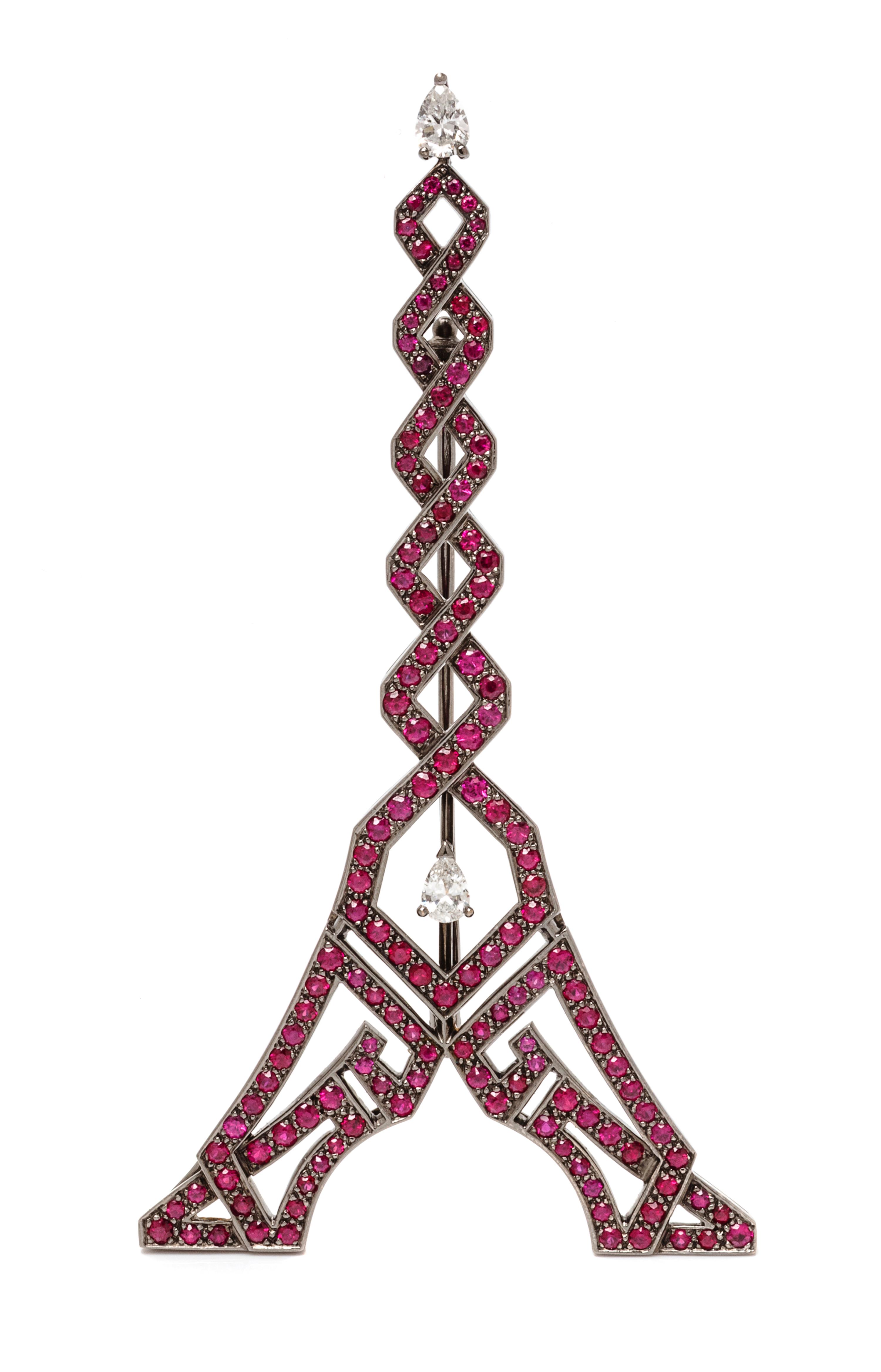 A Black Rhodium 18 Karat Gold, Diamond and Ruby Eiffel Tower Brooch, Boucheron, 13.00 dwts.