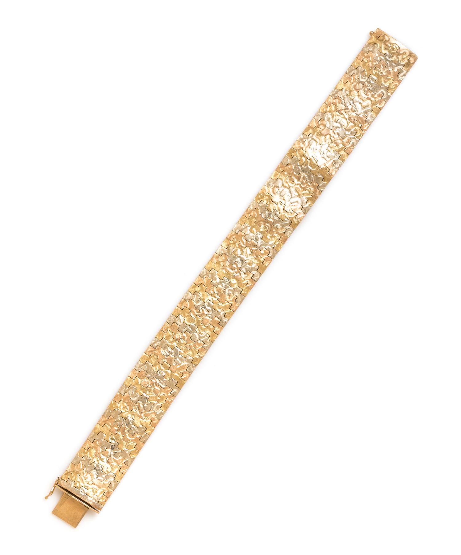 An 18 Karat Tricolor Gold Bracelet, 32.60 dwts.