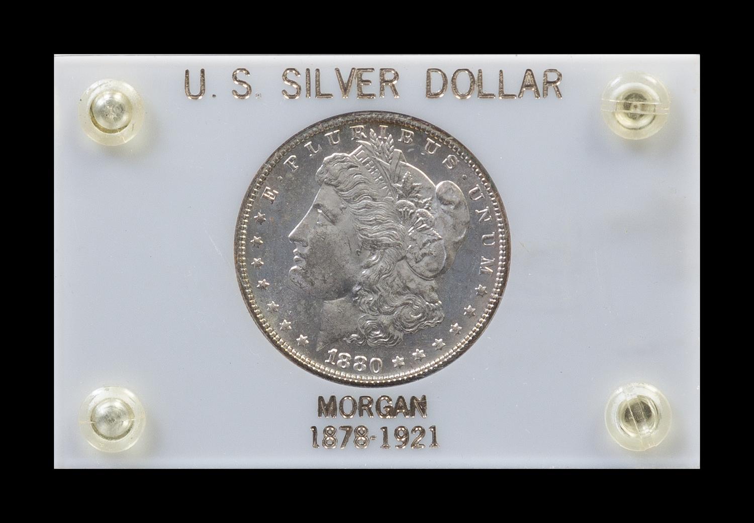 A Group of 29 Morgan Silver Dollars