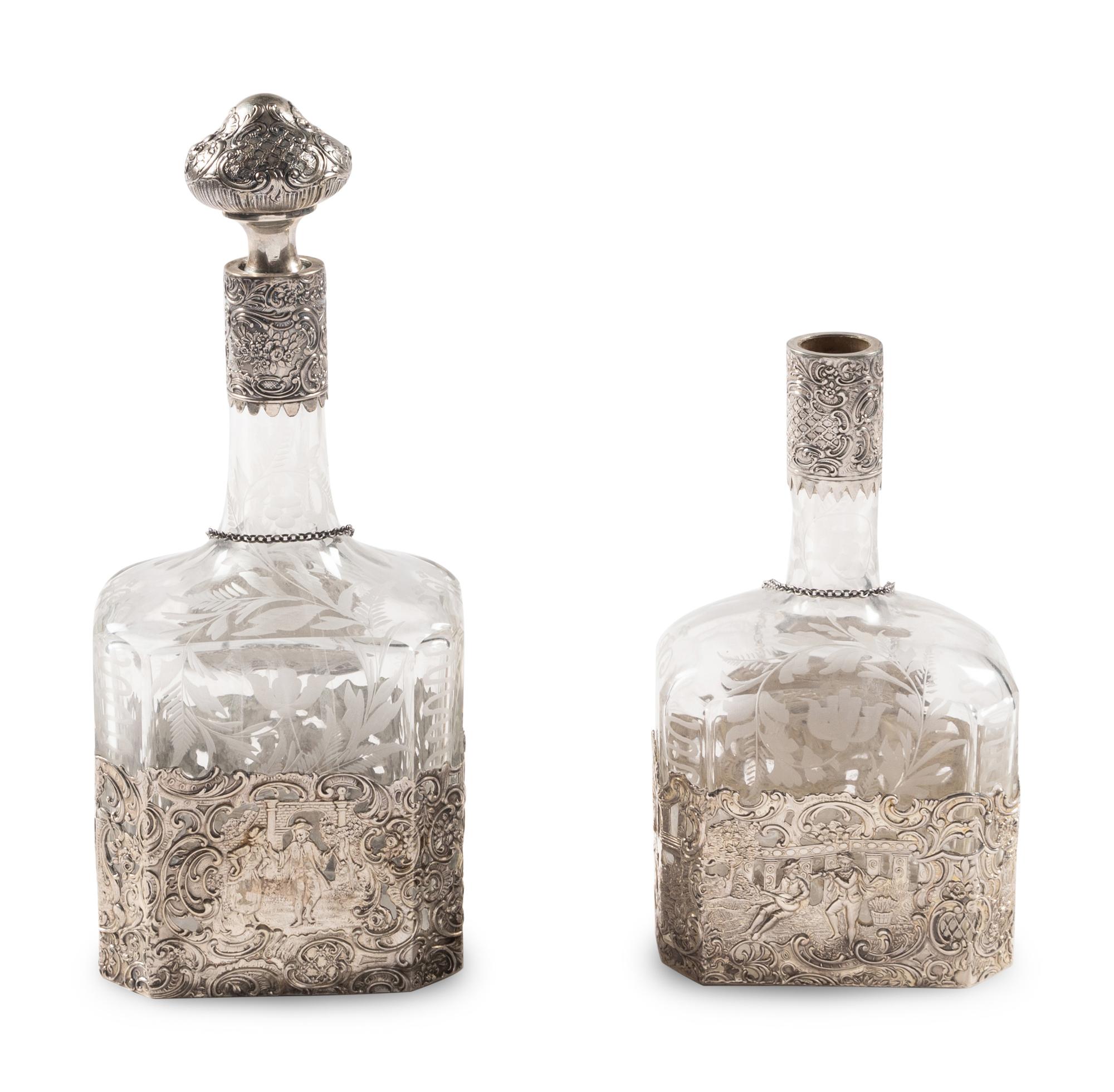 Two Silver Mounted Etched Glass Decanters