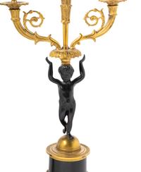 A Pair of Empire Style Parcel Gilt Metal Two-Light Candelabra