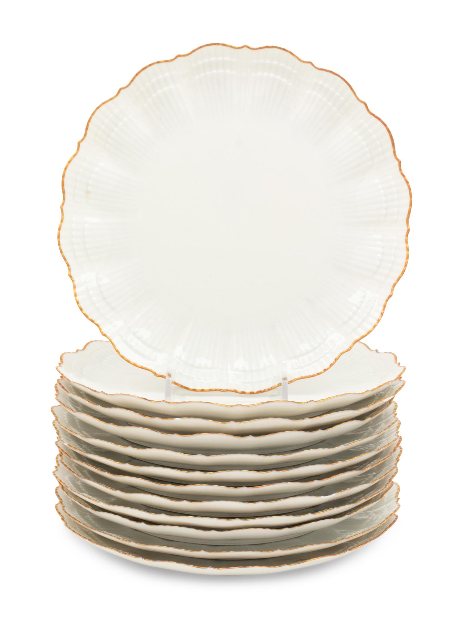 A Set of Twelve Limoges Salad Plates