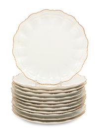 A Set of Twelve Limoges Salad Plates