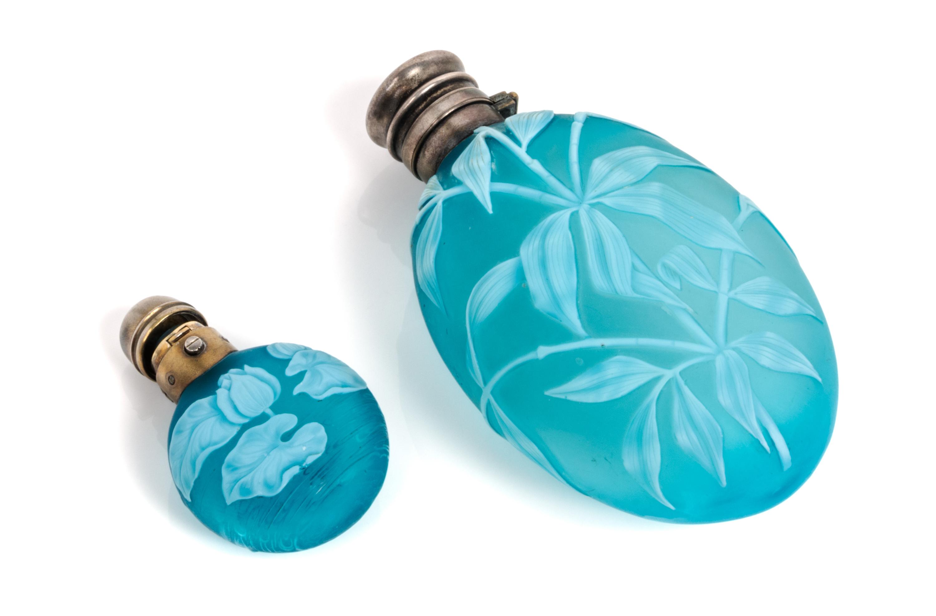 English, LATE 19TH CENTURY, two silver mounted cameo glass perfume bottles, the larger decorated with bamboo leaves and butterflies the