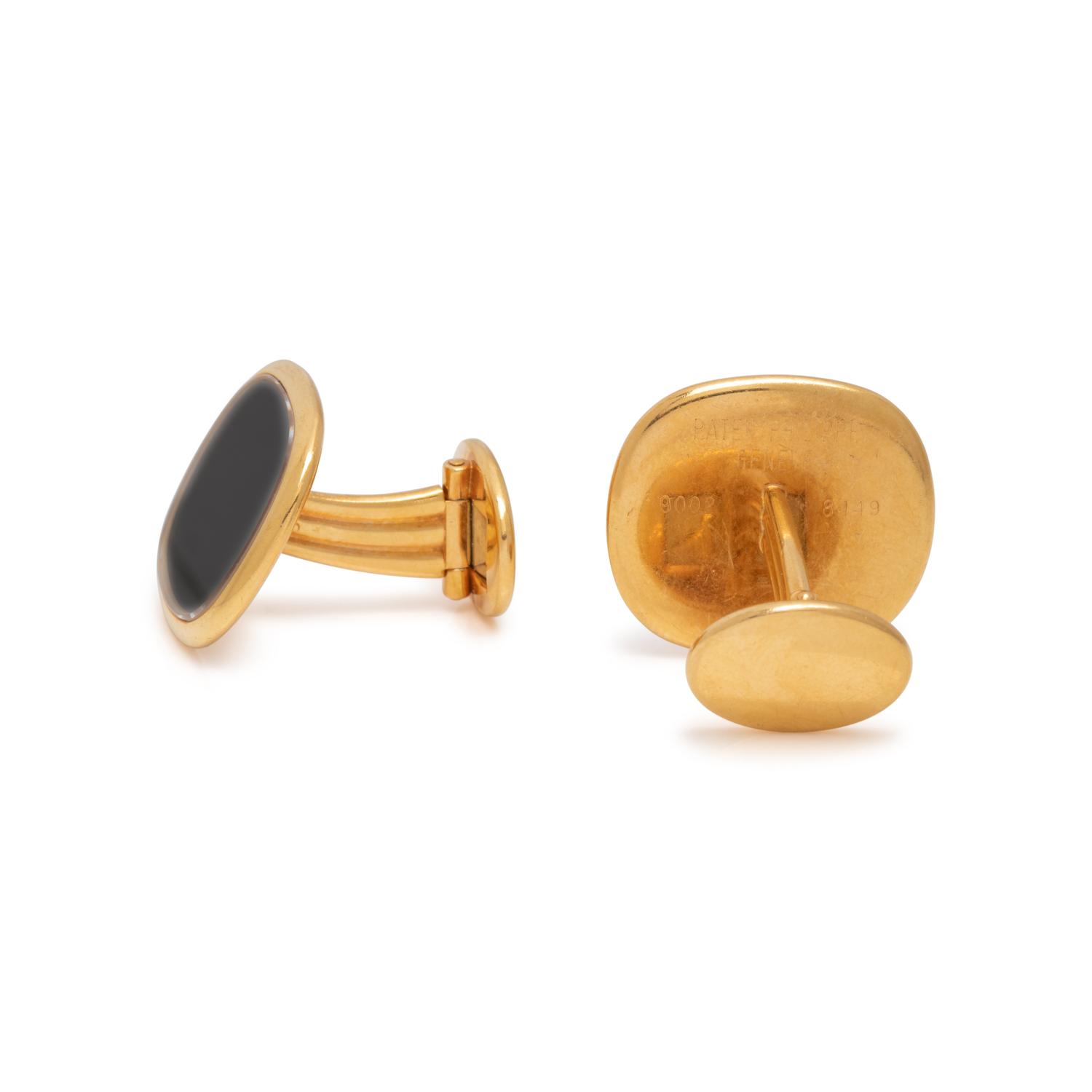 PATEK PHILIPPE, YELLOW GOLD AND HEMATITE CUFFLINKS
