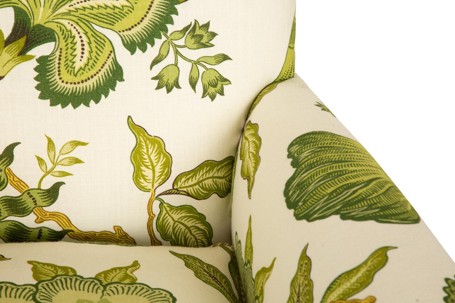 An Upholstered Armchair with Trefoil Shape Ottoman