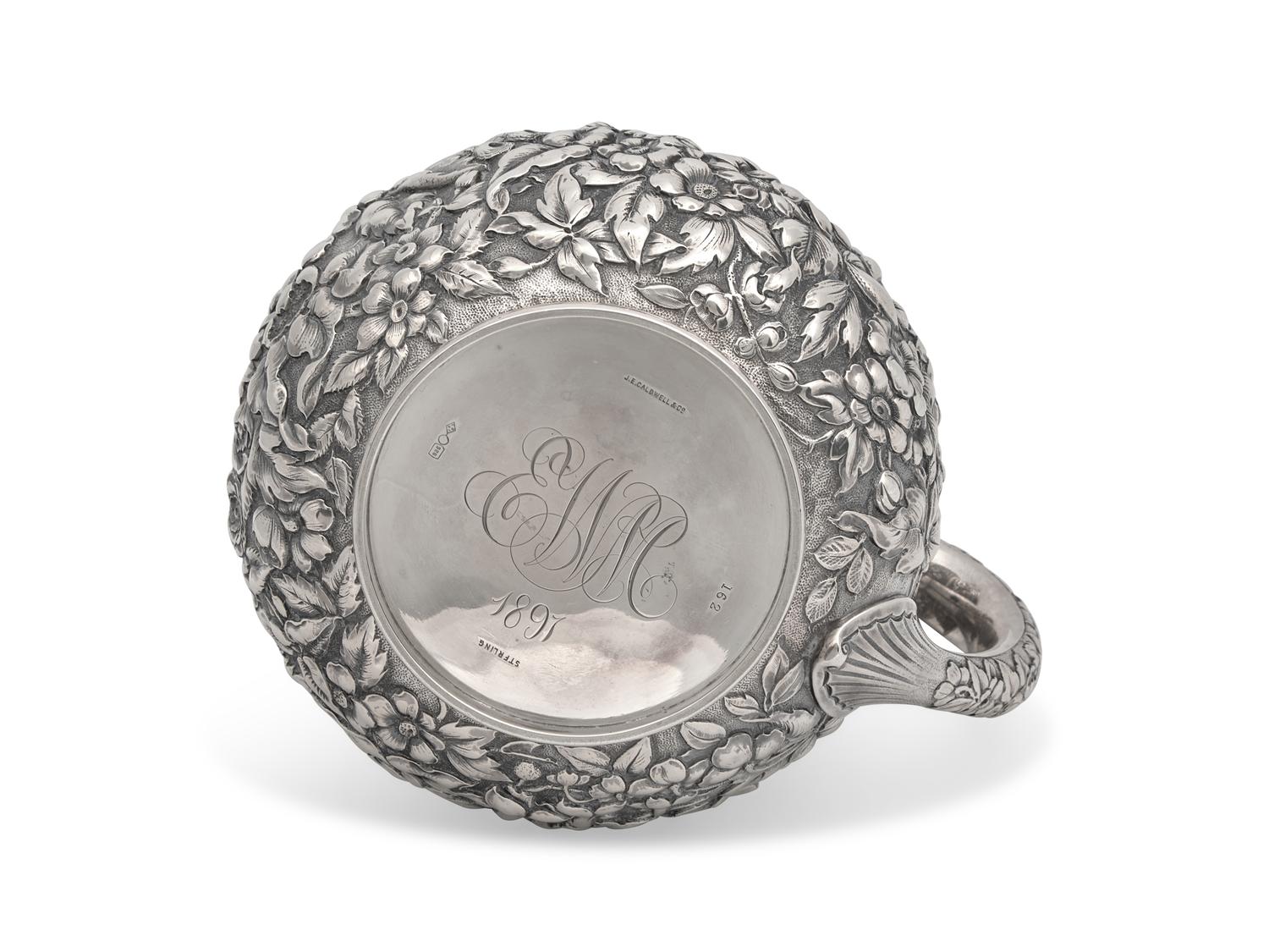 An American Silver Floral Repoussé Water Pitcher