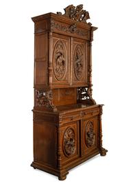 A German Carved Oak Hunt Cabinet
