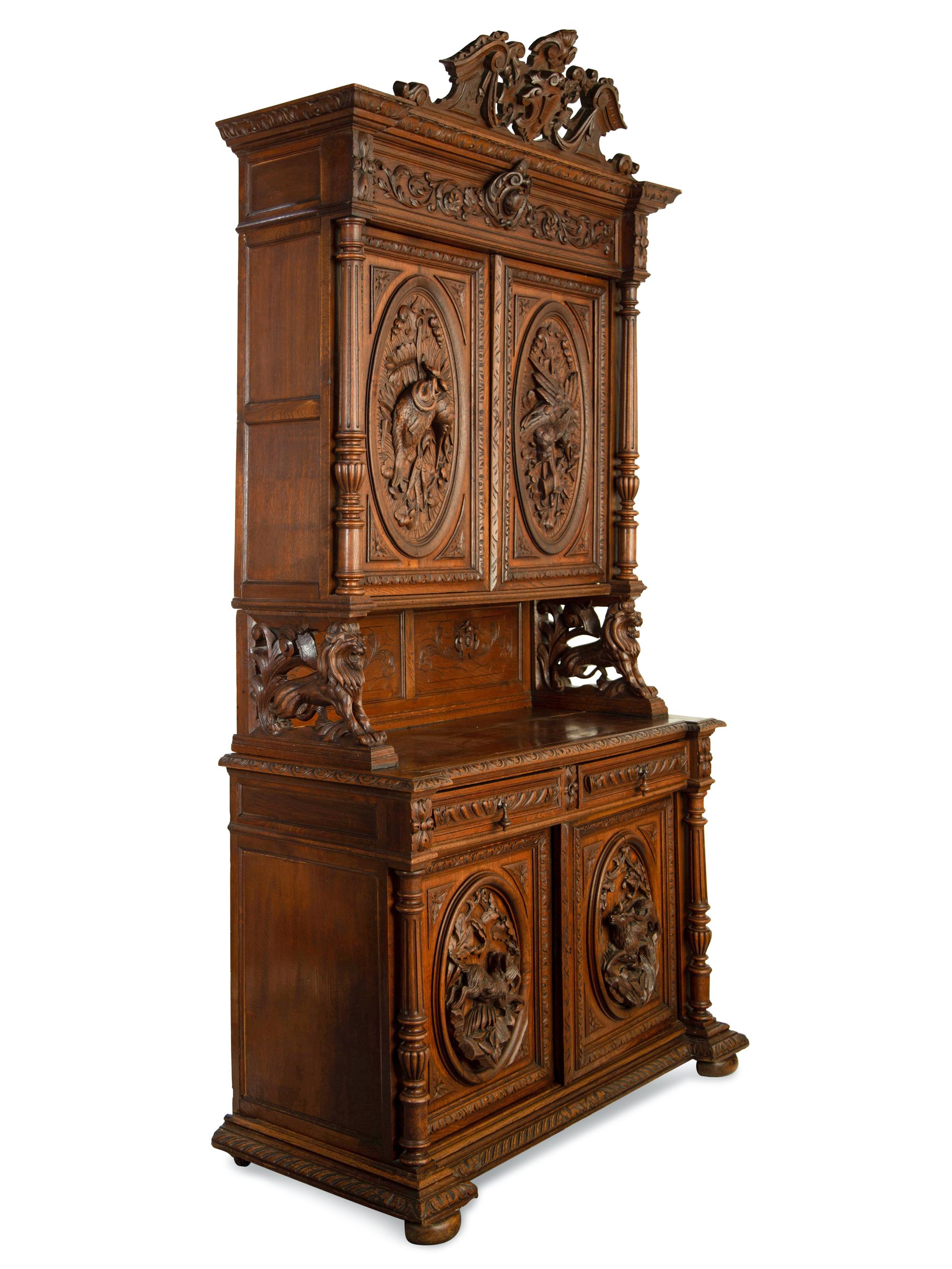 A German Carved Oak Hunt Cabinet