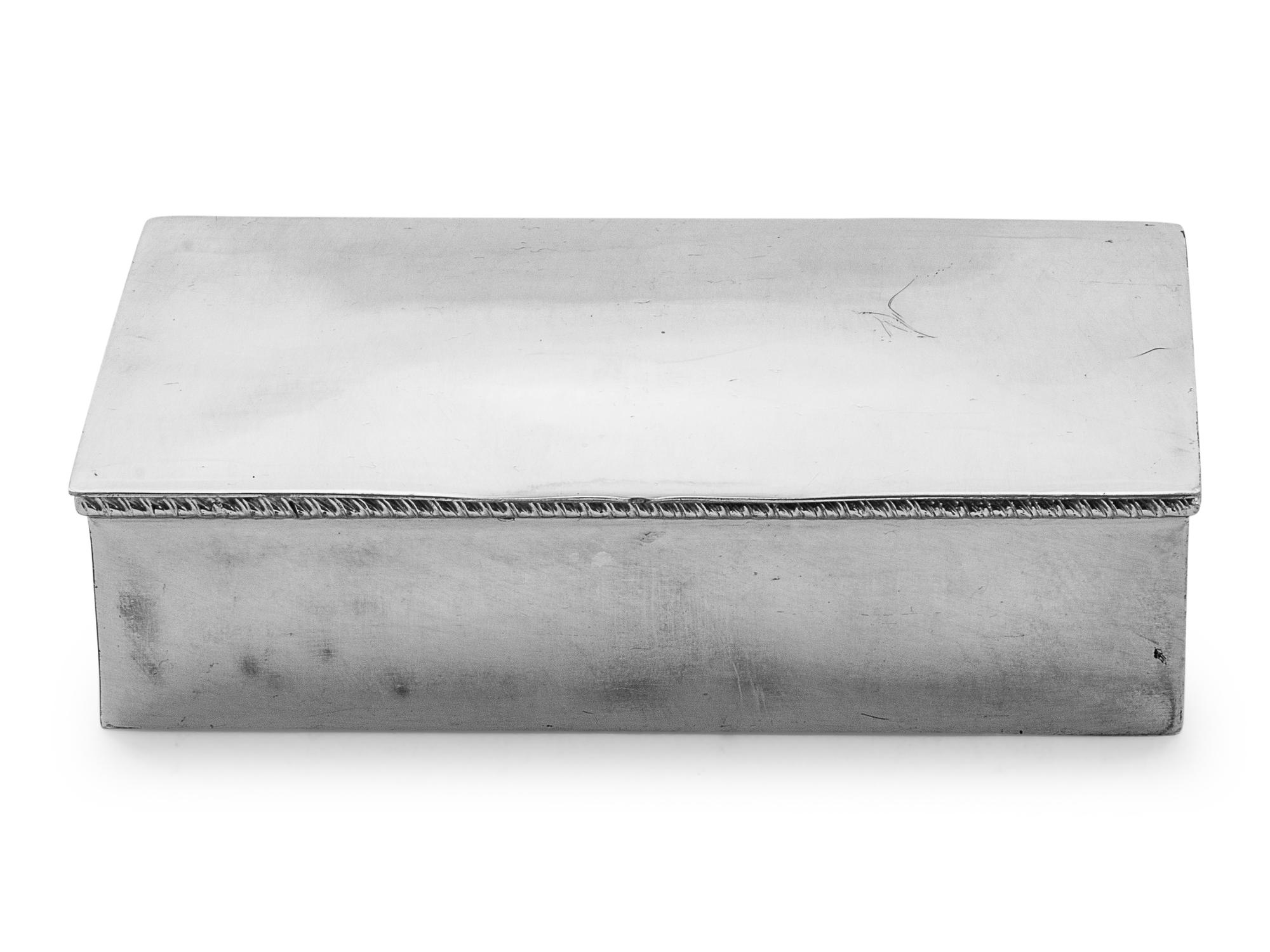 given as a presentation piece and engraved with signatures on the interior hinged lid.