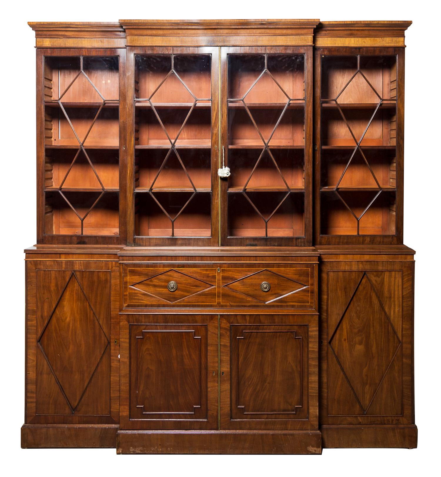 A Regency Style Mahogany Breakfront Bookcase Width 81 1/2 inches.