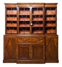 A Regency Style Mahogany Breakfront Bookcase Width 81 1/2 inches.