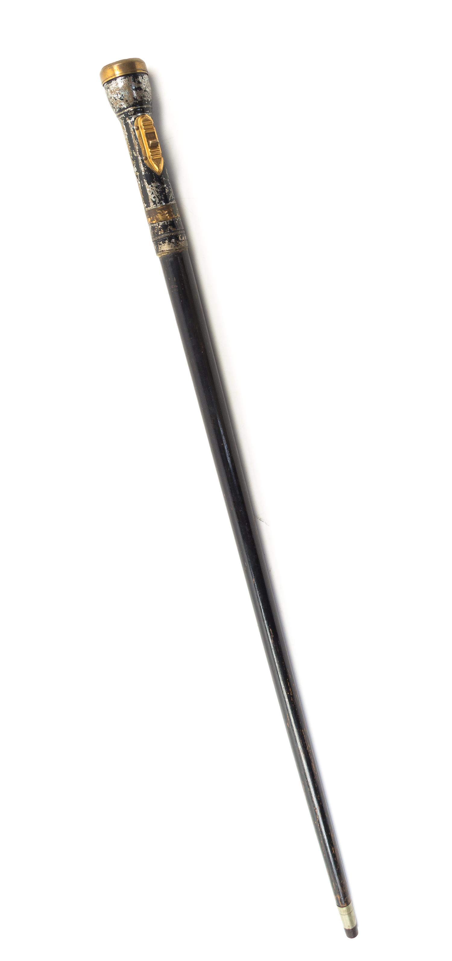 An American Metal and Ebonized Wood Flashlight Cane Length 35 inches.