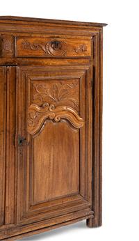 A French Provincial Carved Oak Cabinet