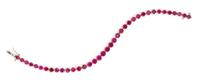 An 18 Karat White Gold and Ruby Line Bracelet, 7.40 dwts.