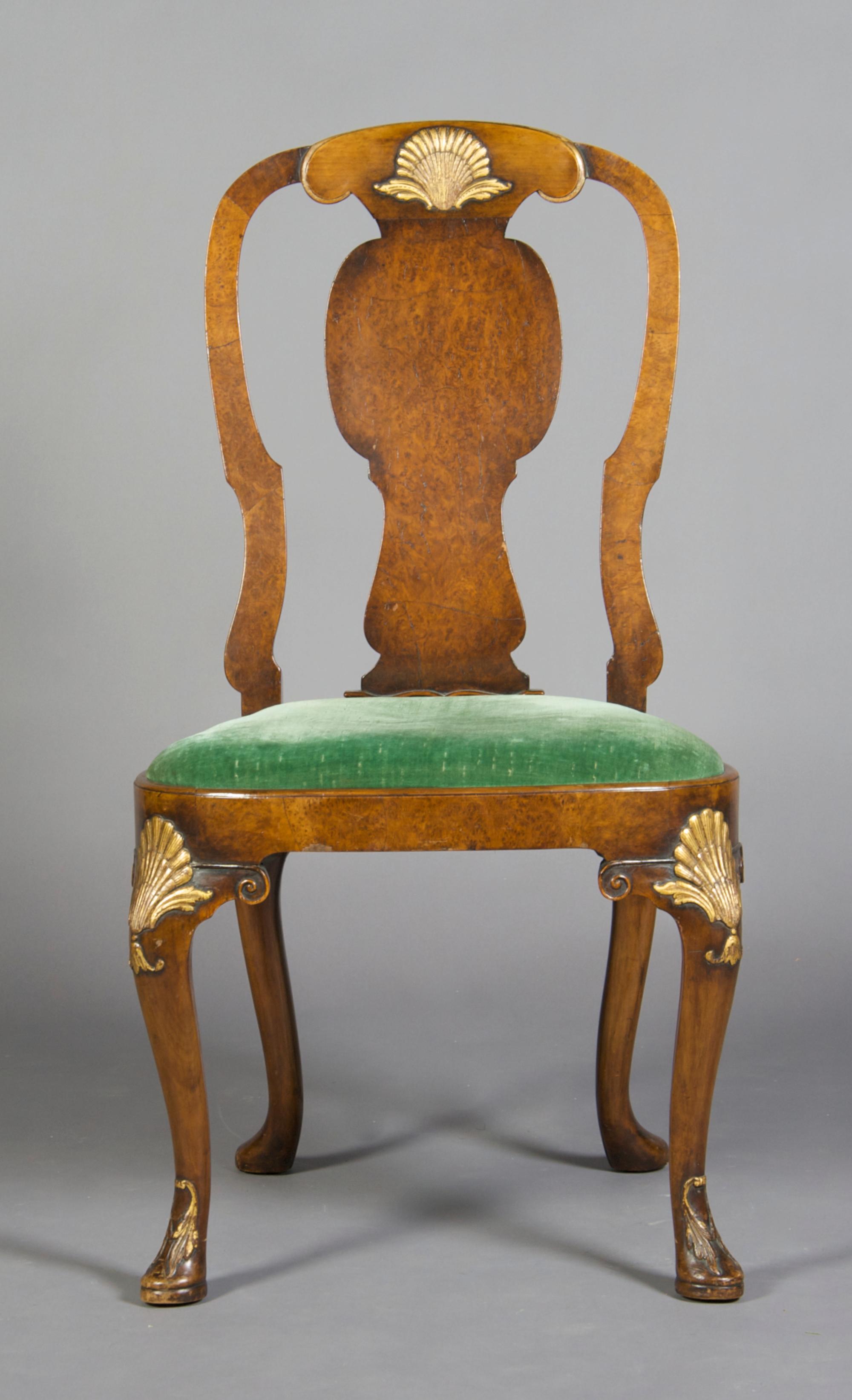 A George II Style Walnut and Parcel Gilt Armchair, Height 38 3/4 inches.