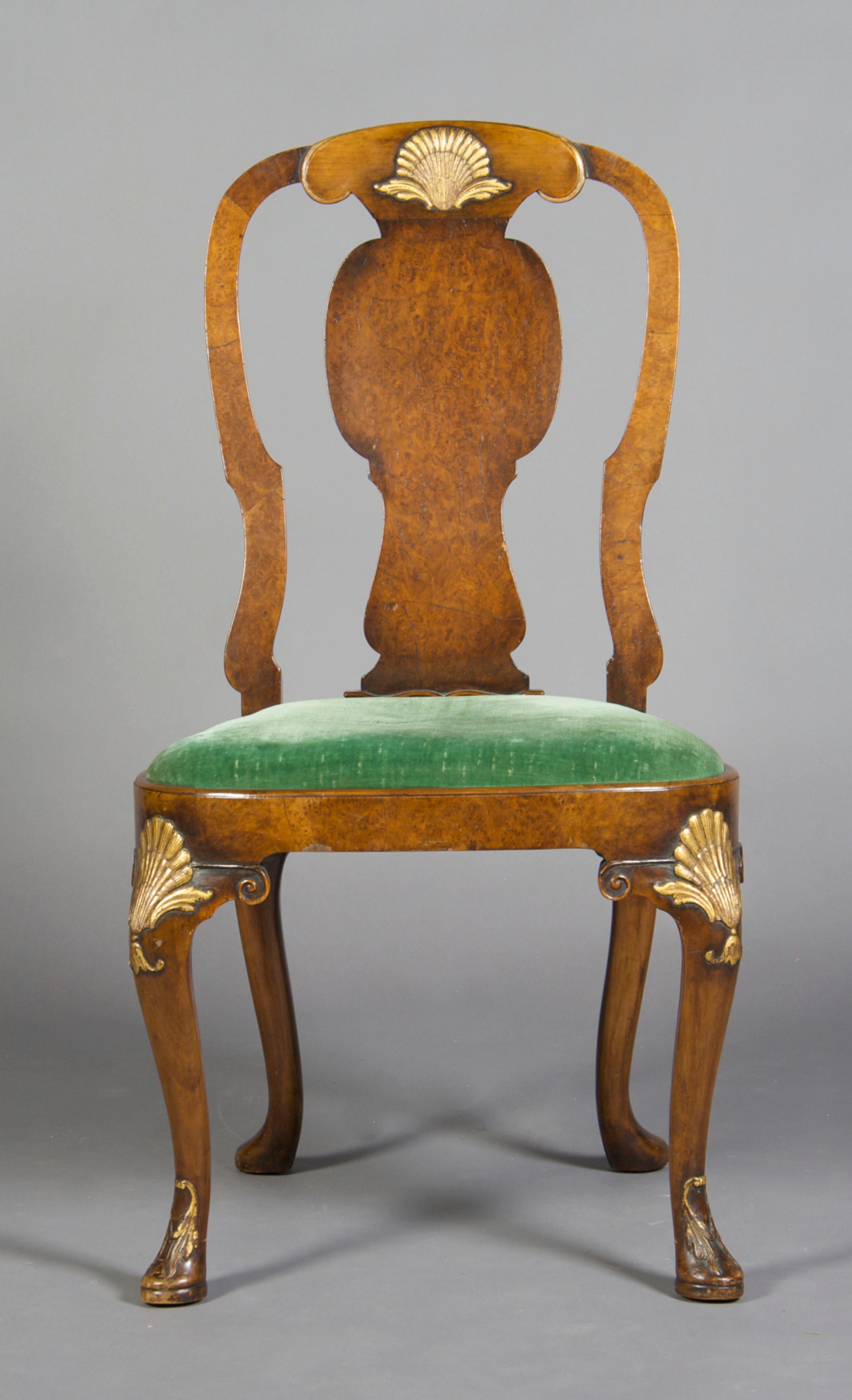 A George II Style Walnut and Parcel Gilt Armchair, Height 38 3/4 inches.