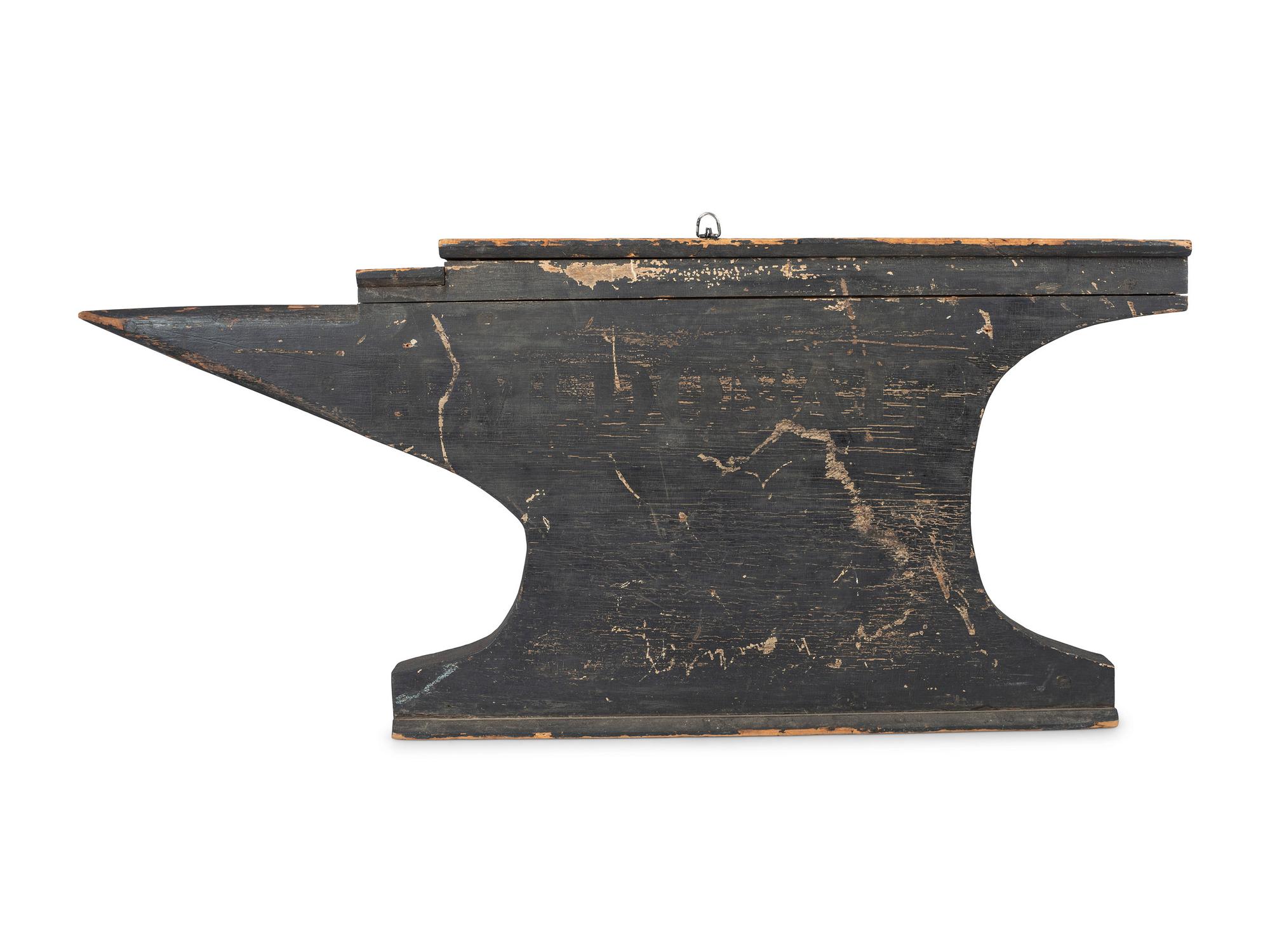 A Carved and Painted Wood Anvil-Form Blacksmith Trade Sign